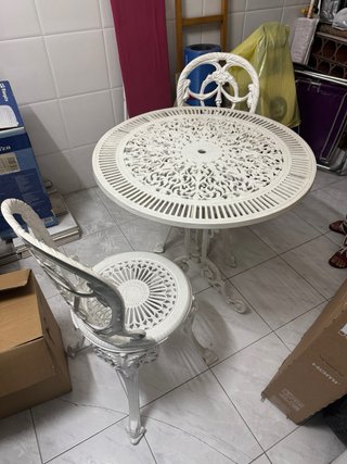 Conjunto mesa silla terraza jardín