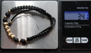 Pulsera bolas de oro de 18k. Peso: 3.41 gr.