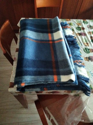 Manta plaid azul y naranja sin estrenar