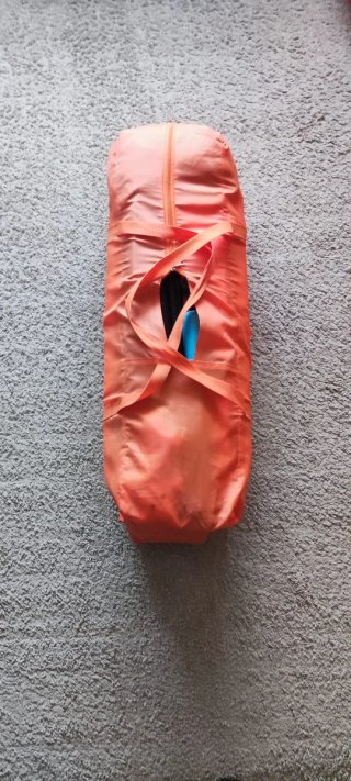 Cuna de viaje naranja y turquesa
