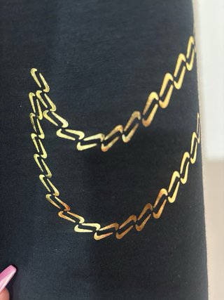 Mallas Nike Negras con Logo Dorado
