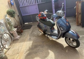 Vespa GTS 125 Gris Naranja