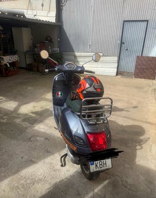 Vespa GTS 125 Gris Naranja