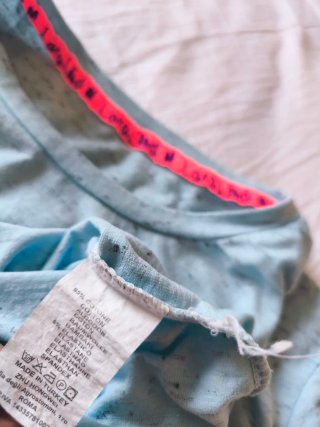 T-shirt azzurra melange con margherite 95% cotone
