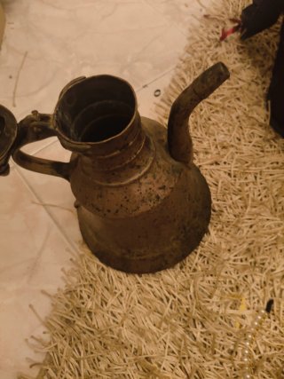 Caffettiera araba antica in rame