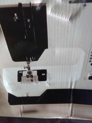 MAQUINA DE COSER ELÉCTRICA DOMESTICA.
