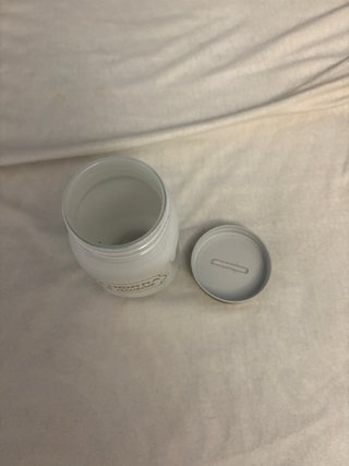 Hucha de cerámica blanca Ahorra o nunca
