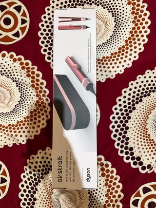 Piastra per capelli Dyson Airstrait in rosa, nuova