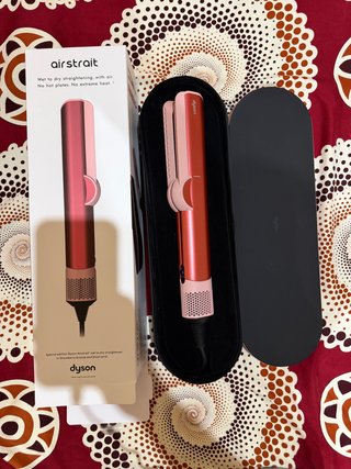 Piastra per capelli Dyson Airstrait in rosa, nuova