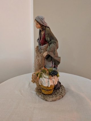 Statuetta terracotta pescatore donna rete