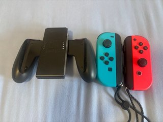 Nintendo Switch OLED Bianca + 2 Joy-Con extra
