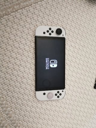 Nintendo Switch OLED + 4 Juegos + 2 Fundas