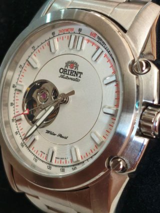 Reloj Orient open heart