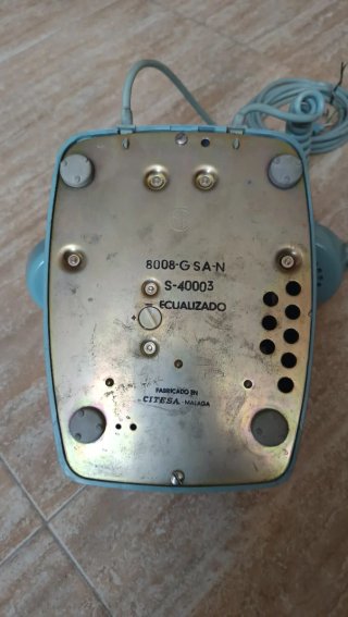 Teléfono Heraldo antiguo azul.