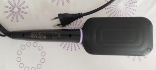 Cepillo alisador eléctrico negro y morado