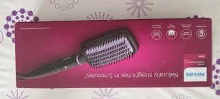 Cepillo alisador eléctrico negro y morado