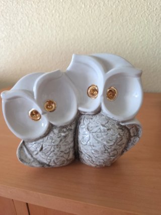 Coppia di gufi decorativi con occhi in oro 18k
