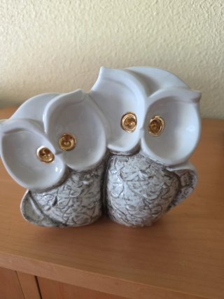 Coppia di gufi decorativi con occhi in oro 18k