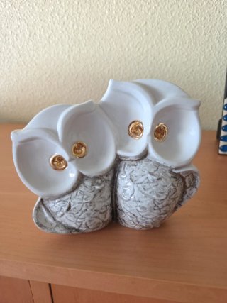 Coppia di gufi decorativi con occhi in oro 18k