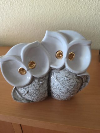 Coppia di gufi decorativi con occhi in oro 18k