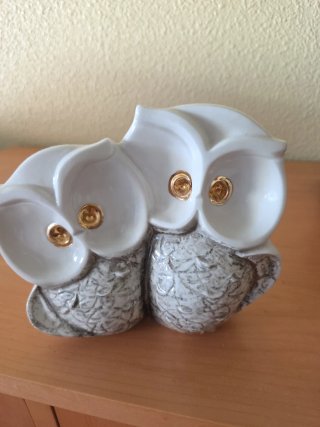 Coppia di gufi decorativi con occhi in oro 18k