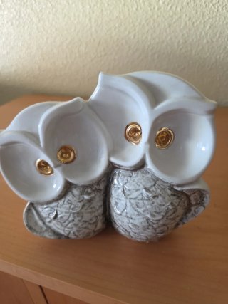 Coppia di gufi decorativi con occhi in oro 18k