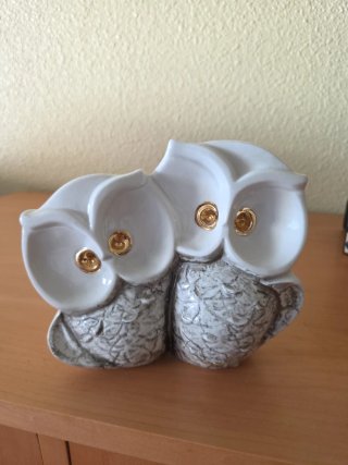 Coppia di gufi decorativi con occhi in oro 18k