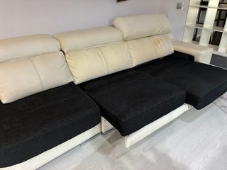 Sofá de piel extensible blanco y negro
