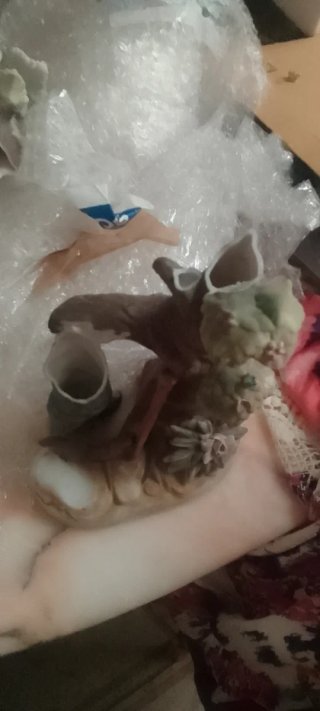 Figura padre e hijo con desperfectos