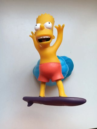 Colonia. Figura Bart Simpson Surfista