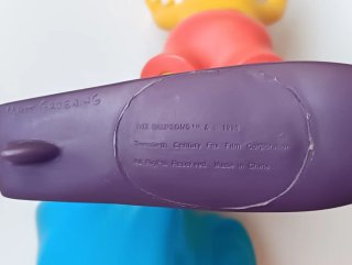 Colonia. Figura Bart Simpson Surfista