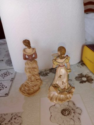 Muñecas de porcelana estilo victoriano