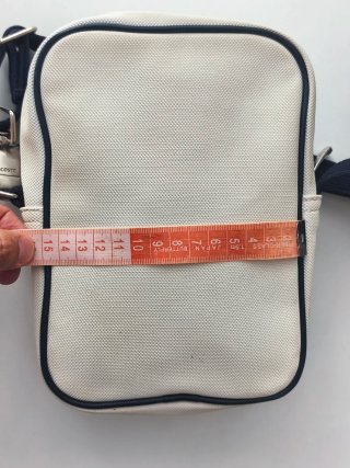 Bolso Lacoste blanco lona