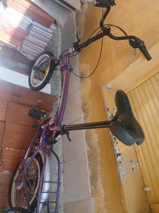 Bicicleta Plegable Morada para arreglar o piesas .