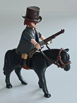 Playmobil jinete con caballo y rifle