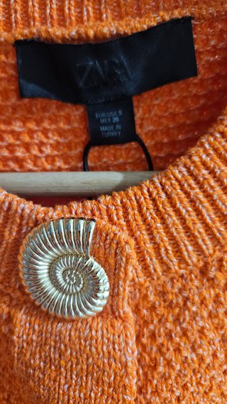 Chaleco naranja botones joya