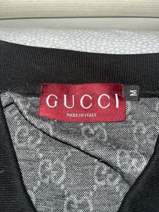 Polo Gucci nero con monogramma GG