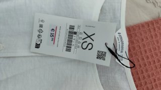 Blusa Stradivarius blanca sin mangas