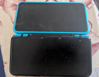 New Nintendo 2DS XL + SD 124GB