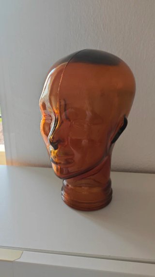 Cabeza decorativa de vidrio ámbar