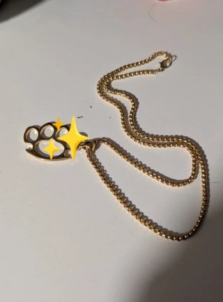 Collar Dorado con detalle p*ñ* *mericano Acero