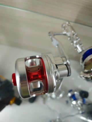Poseidon carrete traina slow pitch vertical jiggin