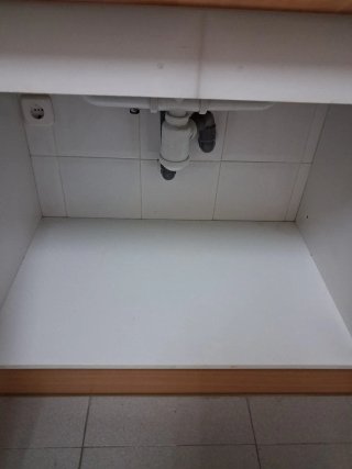 Muebles de cocina beige y marrón