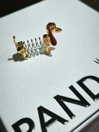 Charm Slinky Toy Story Disney Dorado con caja