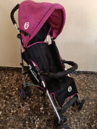 Cochecito bebé rosa y negro