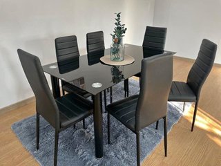 Mesa cristal templado y 6 sillas polipiel