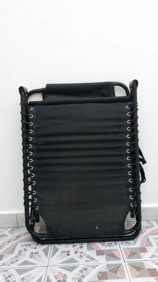 Tumbona plegable negra