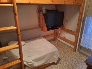 Cama litera madera con escritorio y baúl
