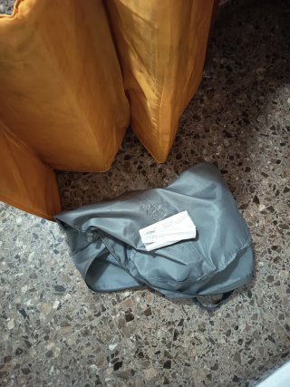 Cuna de viaje naranja y gris