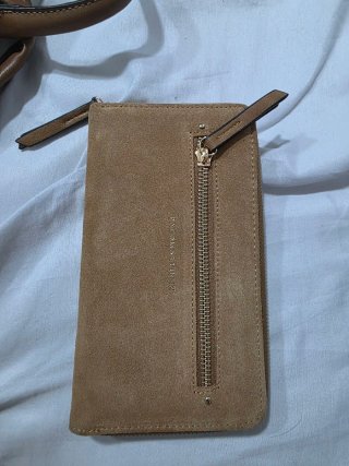 Mochila y billetera Paco Martínez marrón